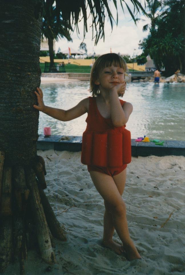 A small Danica at a beach pool, somewhere warm and far from any meal plan